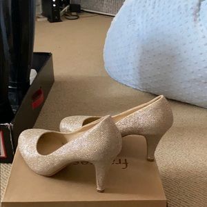 Glittery gold pumps